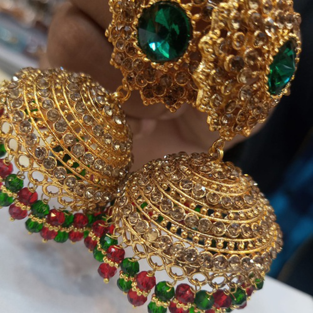 Traditional eastern Golden jhumka with green stones